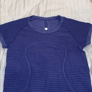 Blue lululemom cap sleeve athletic top.
